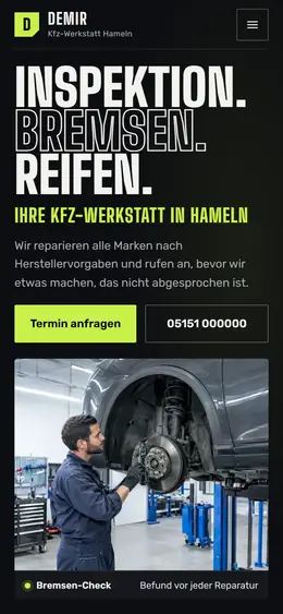 Derselbe Beispiel-Entwurf der Kfz-Werkstatt auf dem Handy